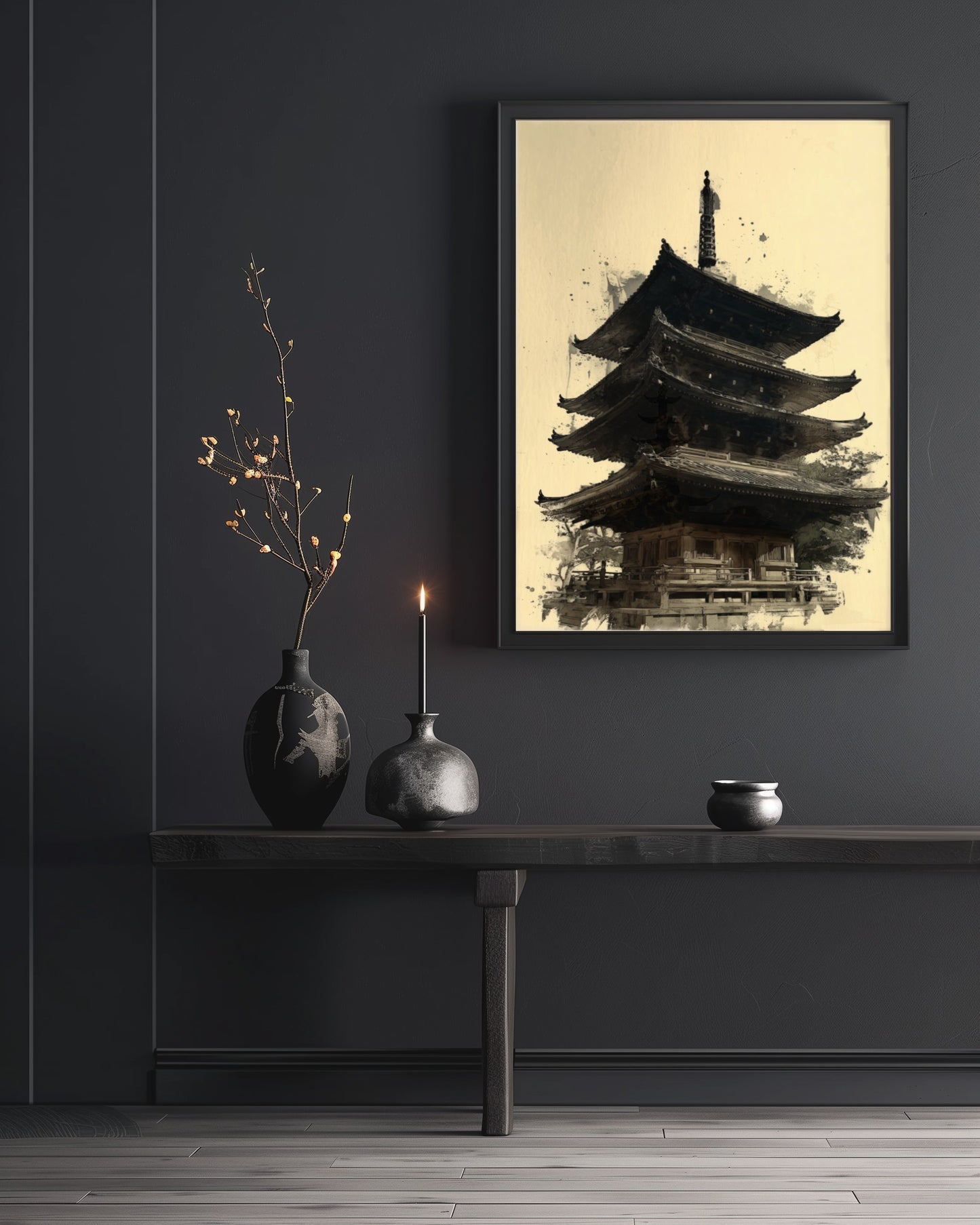 Japanese pagoda sumi-e print on a moody dark entryway wall with candle and ceramic vessels