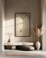 Beneath the Falling Petals print in a black frame above a stone bench in a calm alcove with dried pampas grass, Yugen Print