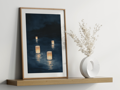 Sumi-e style indigo ink print of paper lanterns glowing on dark water, oak frame leaning on a floating wood shelf beside a white ceramic vase, Yugen Print