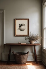 Fugu Bloom sumi-e ink pufferfish print framed on the wall of a softly lit, minimally styled room