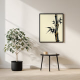 Golden Seam Bamboo print shown framed in a living room (4:5 version), a dark ink bamboo stalk with gold kintsugi seams along its joints on a parchment ground