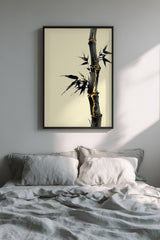 Golden Seam Bamboo print shown framed in a bedroom, a dark ink bamboo stalk with gold kintsugi seams along its joints on a parchment ground