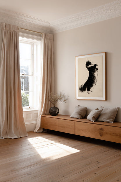 A styled interior room with a wooden bench, beige curtains, a window, and a framed black-and-white artwork on the wall.