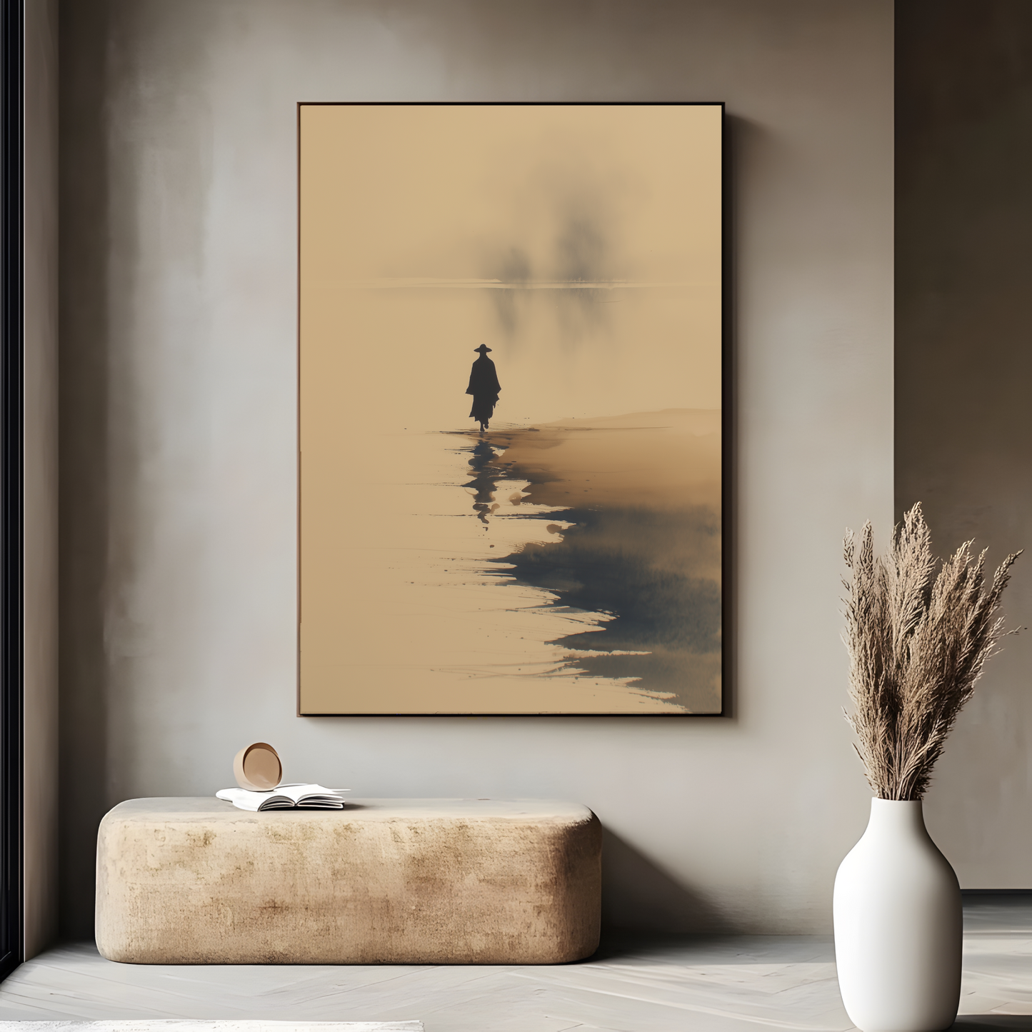 Sumi-e style ink wash print of a solitary figure at the water's edge in mist, in a dark frame above a stone bench with pampas grass, Yugen Print