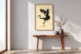 Kintsugi Dancing Crane print shown framed in an entryway, a red-crowned crane lifts a foot and arches its wings, ink splashing and gold pooling at its feet