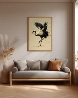 Kintsugi Dancing Crane print shown framed in a living room, a red-crowned crane lifts a foot and arches its wings, ink splashing and gold pooling at its feet