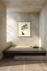 Kintsugi Moon Jar print shown framed in a meditation room, a round white moon jar with gold kintsugi seams holding a spray of dark leaves on a pale ground