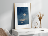 Night Lotus print in a wood frame leaning on a white desk beside dried grasses, Yugen Print