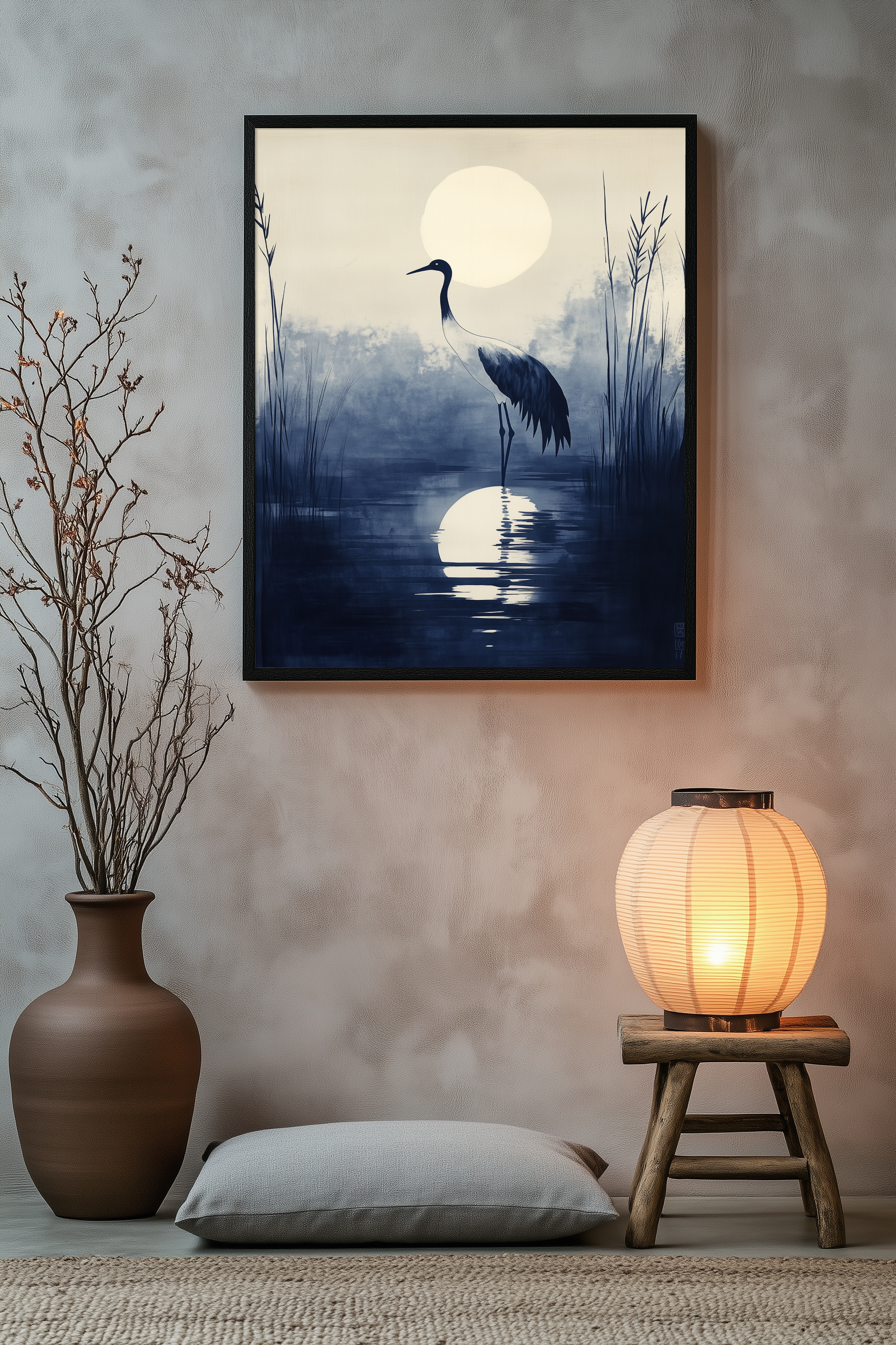 Sumi-e style indigo ink print of a crane silhouetted beneath a full moon, black frame above a floor cushion beside a glowing paper lantern on a wooden stool, Yugen Print
Evening be