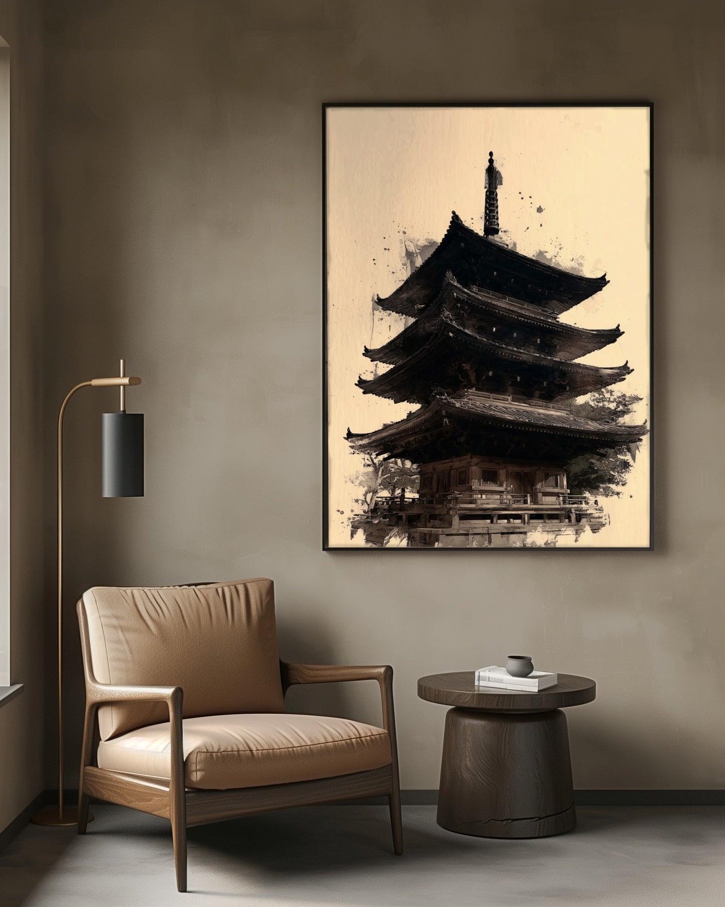 Japanese pagoda sumi-e print hanging in a sophisticated reading nook with leather chair and brass lamp