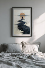 Path to the Setting Sun sumi-e print in a black frame above a bed with gray linen bedding