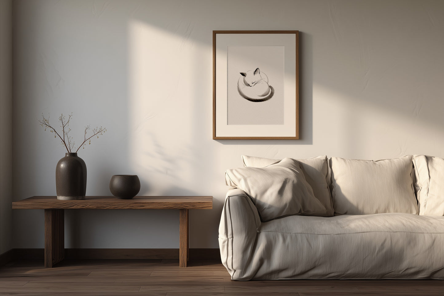 Maru, The Sleeping Cat print in a living room with a neutral sofa and ceramic vase, Yugen Print