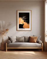 The Cliff Tree sumi-e print framed above a gray linen sofa in a neutral living room