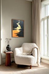 The Golden River sumi-e print framed beside a white armchair and side table in a reading corner by the window