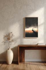 The Last Pier sumi-e print framed above a dark wood console and a cream vase on a plaster wall