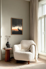 The Last Pier sumi-e print framed beside a white armchair and side table in a reading corner by the window
