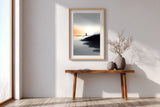 The Narrow Crossing sumi-e print in an oak frame above a narrow wood console in a bright entryway