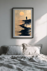 The Ronin's Moon sumi-e print in a black frame above a bed with gray linen bedding