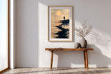 The Ronin's Moon sumi-e print in an oak frame above a narrow wood console in a bright entryway