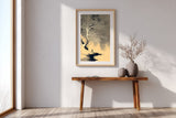The White Tree sumi-e print in an oak frame above a narrow wood console in a bright entryway