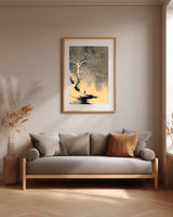 The White Tree sumi-e print framed above a grey linen sofa in a neutral living room