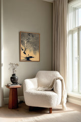 The White Tree sumi-e print framed beside a white armchair and side table in a reading corner by the window