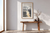 Wayfarer's Reflection sumi-e print in an oak frame above a narrow wood console in a bright entryway