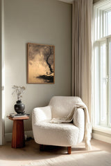 Winter Willow sumi-e print framed beside a white armchair and side table in a reading corner by the window