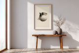 Fugu Puff print framed above a wooden console in a bright entryway, Yugen Print