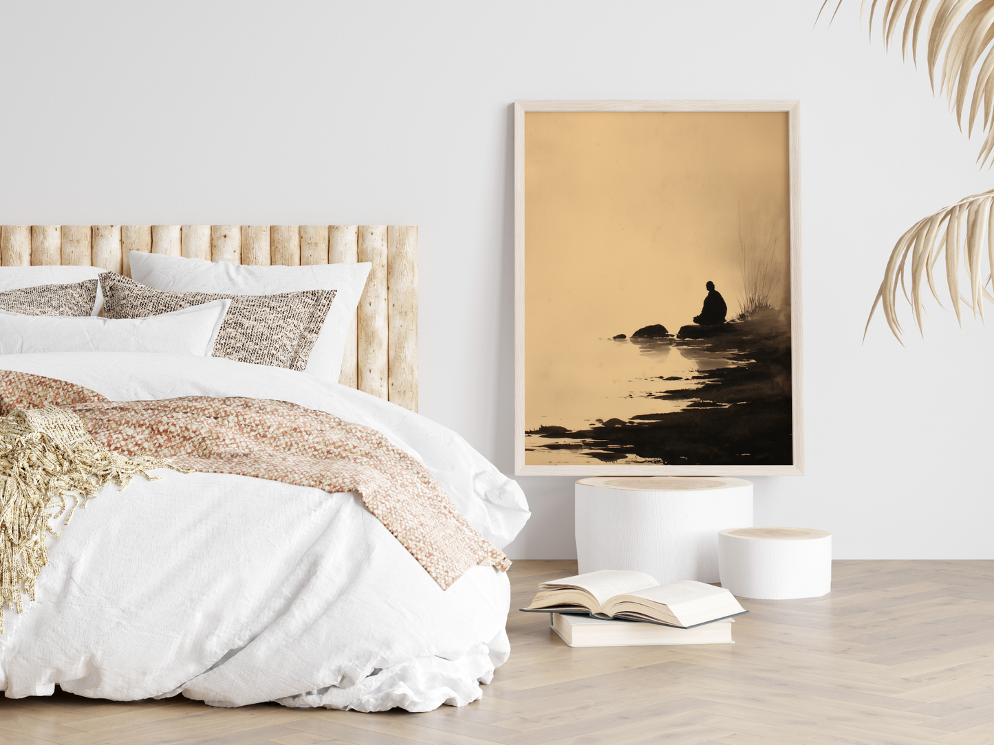 Sumi-e style ink wash print of a solitary figure seated by still water in mist, framed in light wood in a neutral bedroom above stacked books, Yugen Print